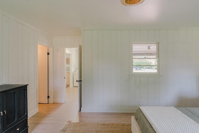 115 W St, Thomson, GA 30824 - bedroom with light wood-style floors and baseboards