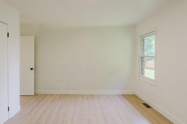 115 W St, Thomson, GA 30824 - unfurnished room featuring light wood-style floors and baseboards