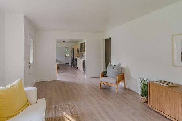 115 W St, Thomson, GA 30824 - sitting room featuring light wood-type flooring