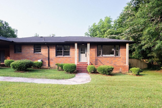 115 W St, Thomson, GA 30824 - ranch-style house with brick siding