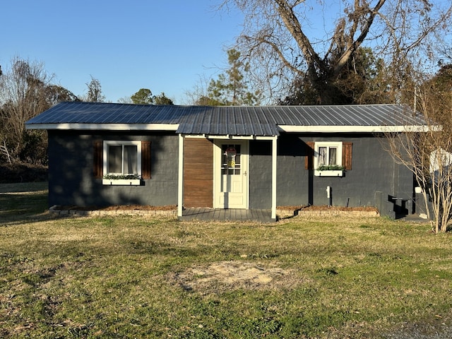 view of outbuilding featuring a yard