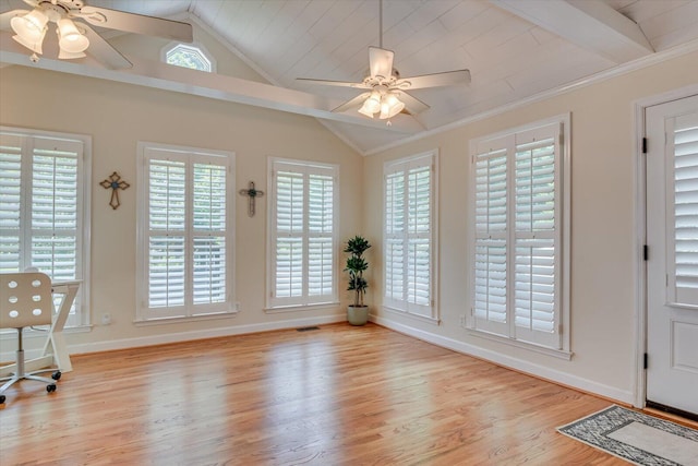 entrance foyer with lofted ceiling with beams, light hardwood / wood-style floors, a healthy amount of sunlight, and ceiling fan