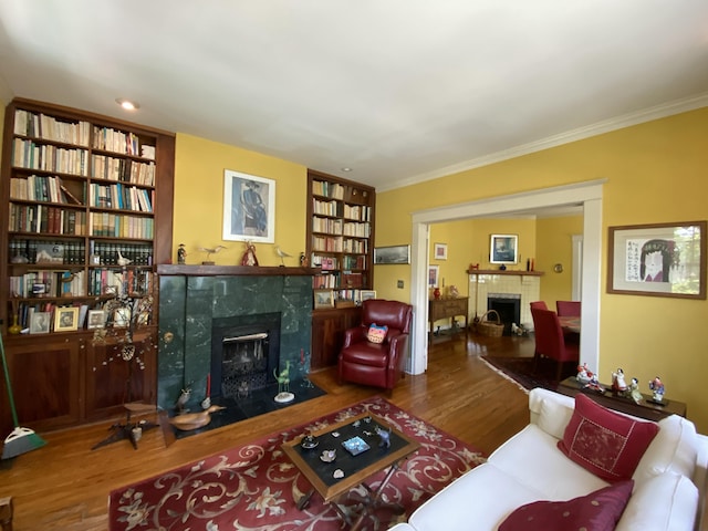 1433 Glenn Ave, Augusta, GA 30904 - living room with a fireplace, wood finished floors, and ornamental molding