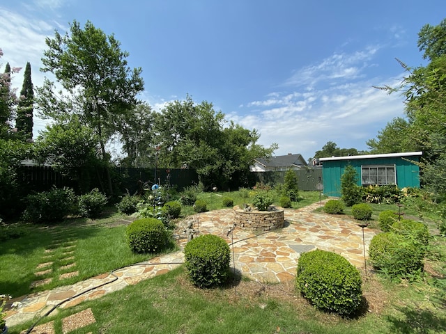 1433 Glenn Ave, Augusta, GA 30904 - fenced backyard featuring a patio area and a fire pit