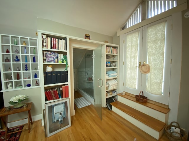 1433 Glenn Ave, Augusta, GA 30904 - living area featuring french doors, wood finished floors, and lofted ceiling