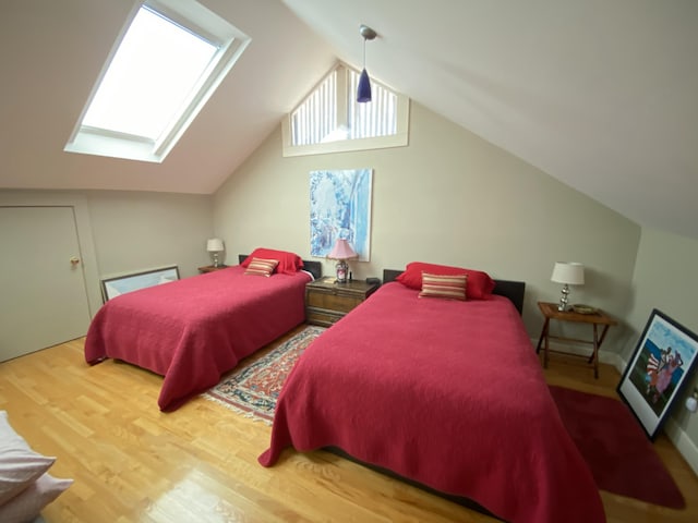 1433 Glenn Ave, Augusta, GA 30904 - bedroom featuring a skylight, wood finished floors, and lofted ceiling