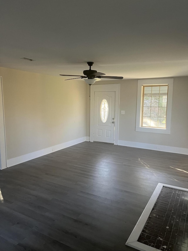 foyer featuring dark hardwood / wood-style floors and ceiling fan