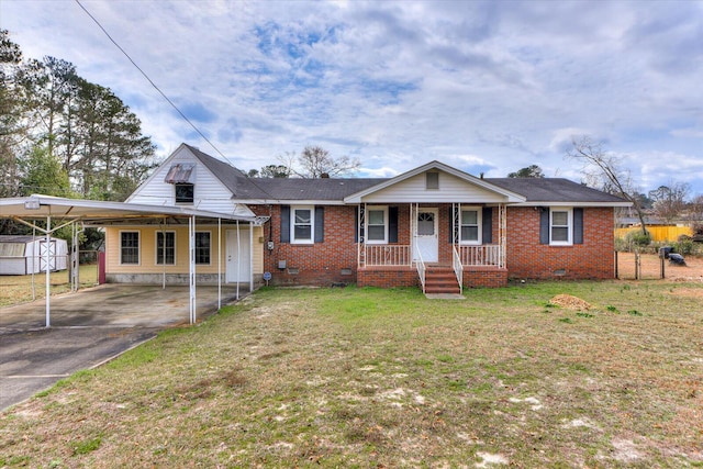 view of front of property with crawl space, covered porch, driveway, and a front lawn