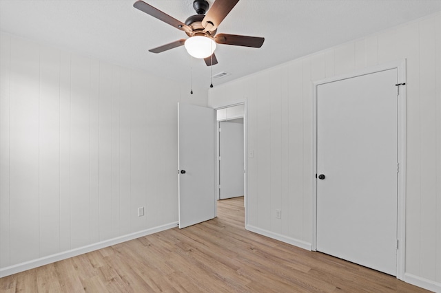3205 E Gerald Dr, Augusta, GA 30906 - unfurnished bedroom featuring light wood-type flooring and ceiling fan
