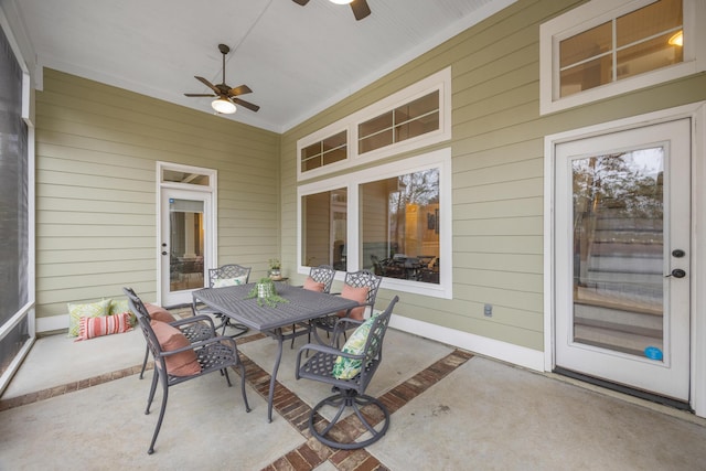 view of patio / terrace featuring outdoor dining area and ceiling fan