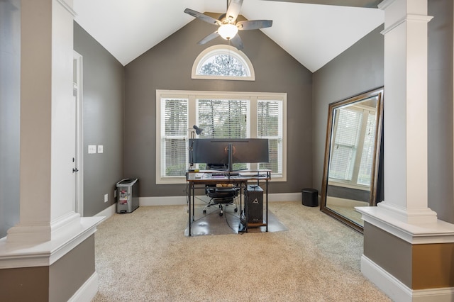 home office with baseboards, ceiling fan, vaulted ceiling, carpet floors, and decorative columns