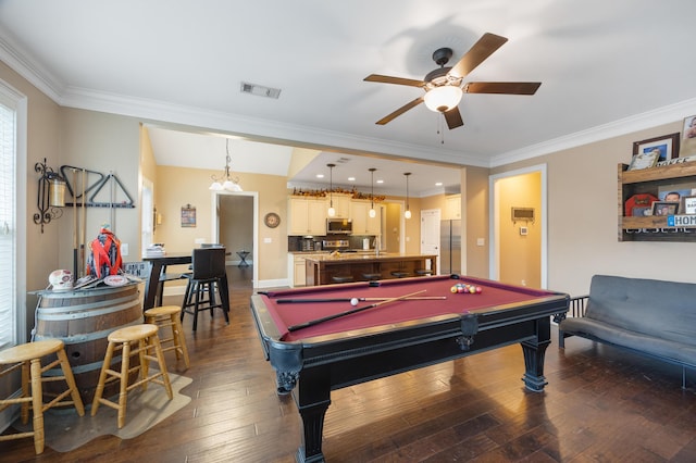 game room featuring visible vents, dark wood-type flooring, ornamental molding, billiards, and a sink