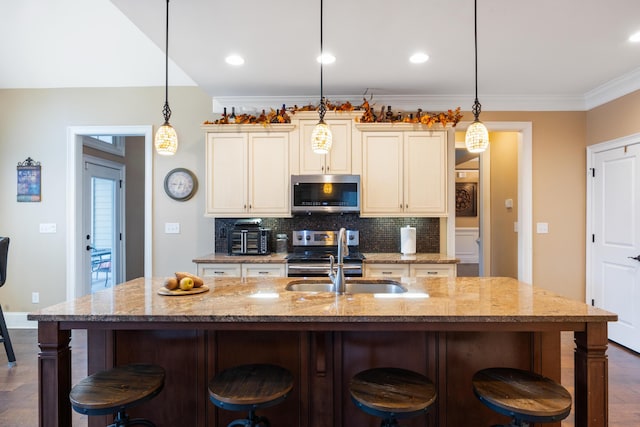 kitchen with dark wood-type flooring, ornamental molding, a sink, backsplash, and stainless steel appliances