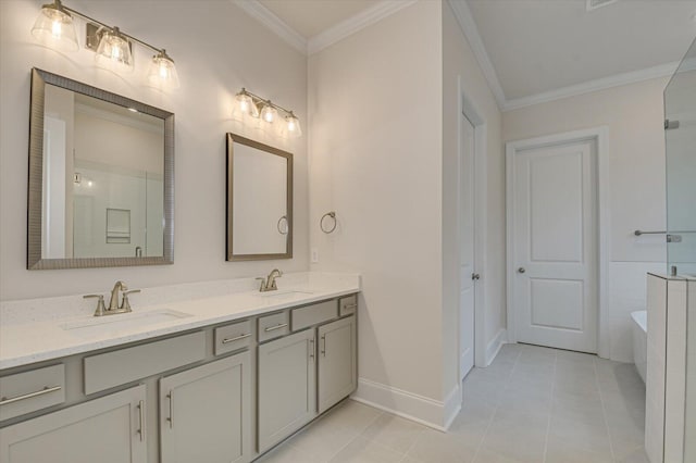 bathroom with tile patterned flooring, vanity, a tub to relax in, and crown molding