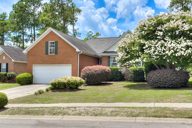 79 Loggerhead Dr, Columbia, SC 29229 - traditional-style home with an attached garage, brick siding, driveway, a front lawn, and a shingled roof