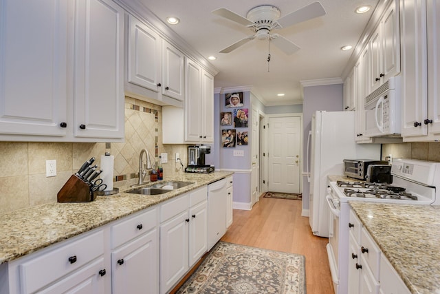 79 Loggerhead Dr, Columbia, SC 29229 - kitchen with white appliances, white cabinetry, a ceiling fan, backsplash, and ornamental molding