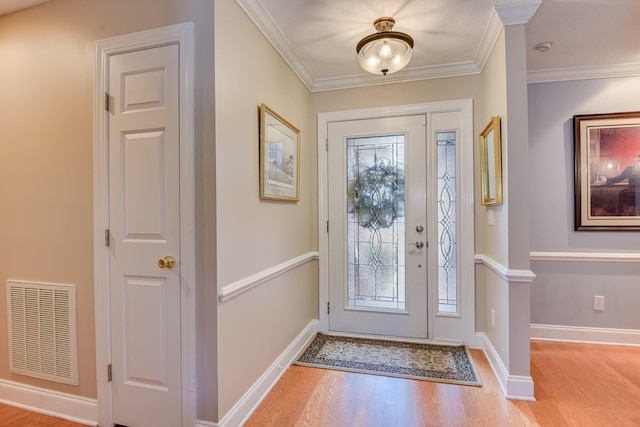 79 Loggerhead Dr, Columbia, SC 29229 - foyer with wood finished floors and ornamental molding