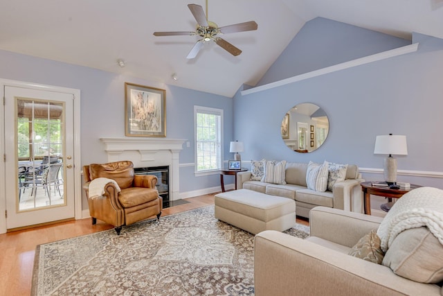 79 Loggerhead Dr, Columbia, SC 29229 - living area featuring wood finished floors, healthy amount of natural light, ceiling fan, and high vaulted ceiling