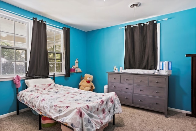 520 Central Rd, Thomson, GA 30824 - bedroom featuring carpet floors, multiple windows, and baseboards