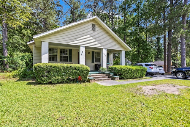 520 Central Rd, Thomson, GA 30824 - bungalow with covered porch and a front lawn