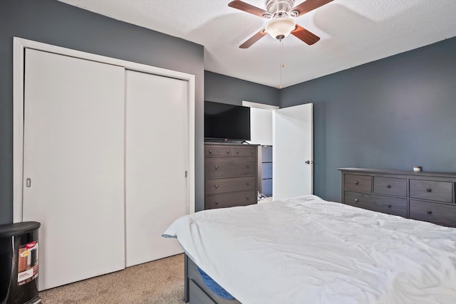 520 Central Rd, Thomson, GA 30824 - bedroom with carpet, a closet, and a ceiling fan