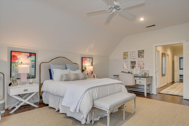 bedroom with visible vents, ceiling fan, vaulted ceiling, recessed lighting, and wood finished floors