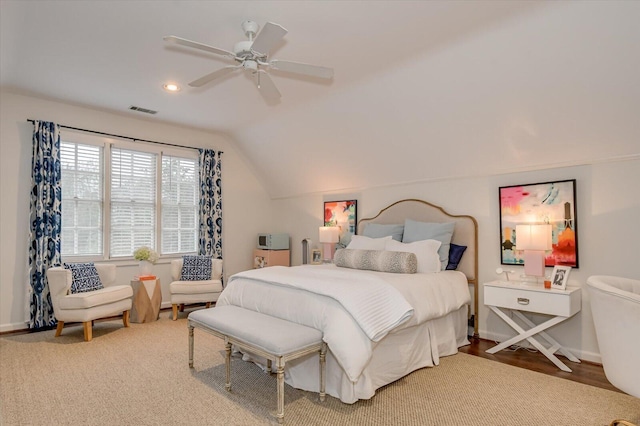 bedroom with visible vents, baseboards, ceiling fan, and vaulted ceiling