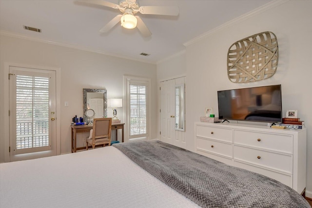 bedroom featuring crown molding, visible vents, and ceiling fan