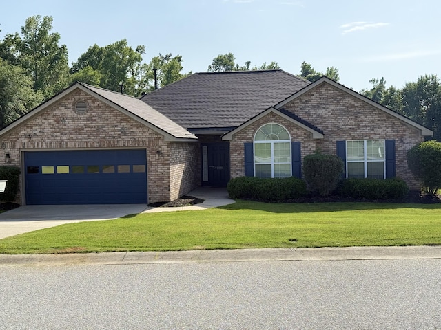 1229 Creek Bend Dr, Grovetown, GA 30813 - single story home featuring a garage, brick siding, driveway, a front yard, and roof with shingles