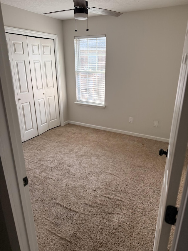 1229 Creek Bend Dr, Grovetown, GA 30813 - unfurnished bedroom with carpet floors, a closet, and baseboards