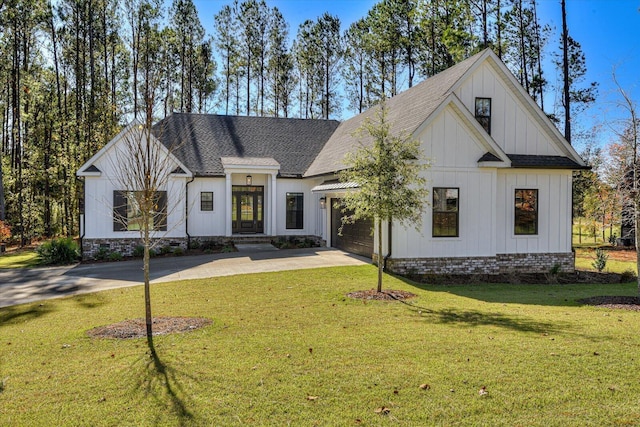 modern inspired farmhouse with a front yard