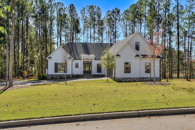 modern farmhouse with a front lawn