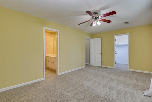 2516 Commons Trce, Augusta, GA 30909 - unfurnished bedroom with light carpet, baseboards, a spacious closet, and ensuite bath