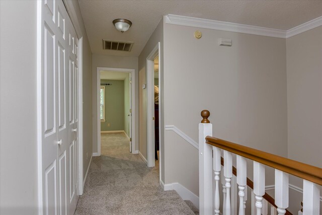 2516 Commons Trce, Augusta, GA 30909 - hallway featuring light carpet, an upstairs landing, and baseboards
