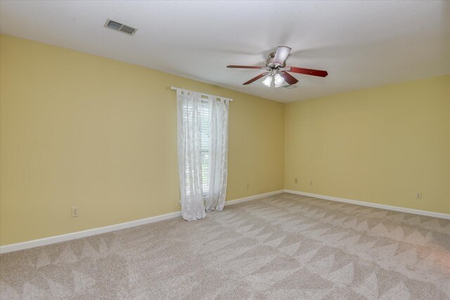 2516 Commons Trce, Augusta, GA 30909 - empty room featuring a ceiling fan, light carpet, and baseboards