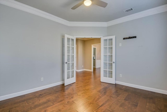 empty room with french doors, ceiling fan, ornamental molding, and hardwood / wood-style floors