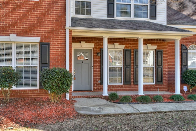 entrance to property with covered porch