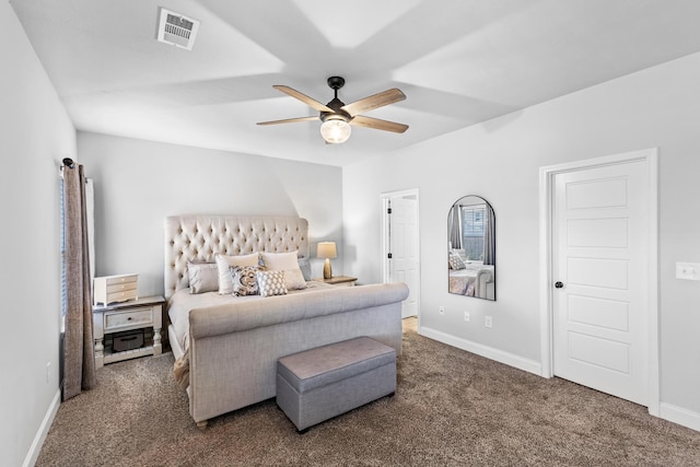 bedroom with ceiling fan and dark colored carpet