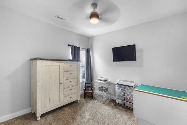 interior space with ceiling fan