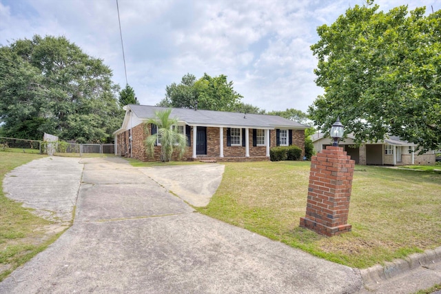 2705 S Vernon Dr, Augusta, GA 30906 - ranch-style home featuring driveway, an outdoor structure, and brick siding