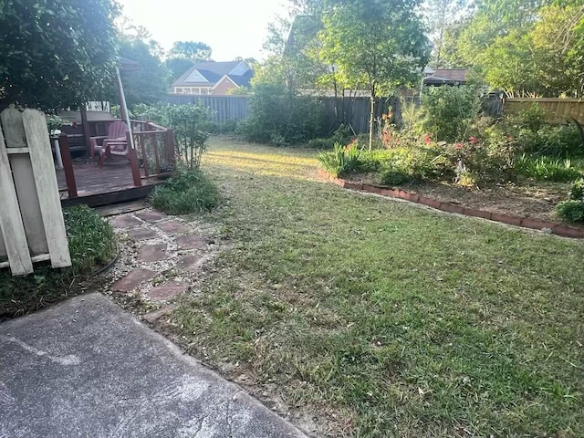 view of yard with a deck