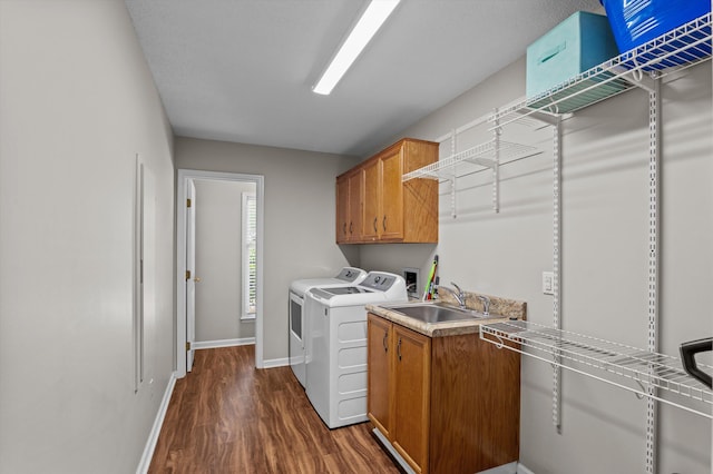 914 Deercrest Cir, Evans, GA 30809 - laundry room featuring dark wood-type flooring, washer and dryer, baseboards, and cabinet space