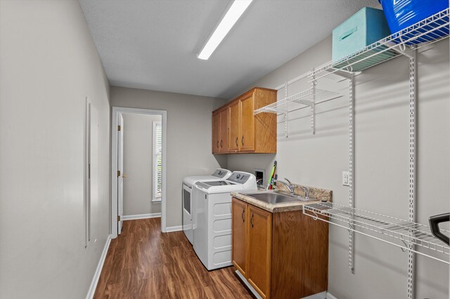 914 Deercrest Cir, Evans, GA 30809 - laundry room featuring dark wood-type flooring, washer and dryer, baseboards, and cabinet space