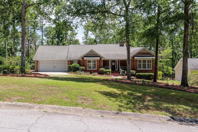 914 Deercrest Cir, Evans, GA 30809 - ranch-style home with a garage, a front lawn, brick siding, a chimney, and driveway