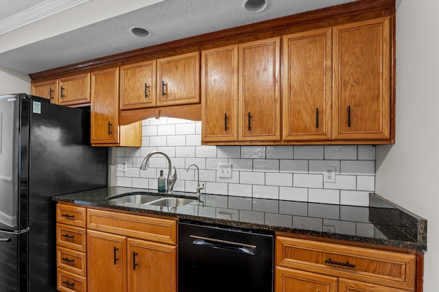 914 Deercrest Cir, Evans, GA 30809 - kitchen with black appliances, a sink, brown cabinetry, and a textured ceiling