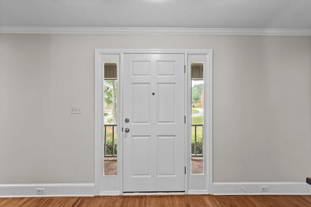 914 Deercrest Cir, Evans, GA 30809 - entrance foyer with plenty of natural light, wood finished floors, ornamental molding, and baseboards