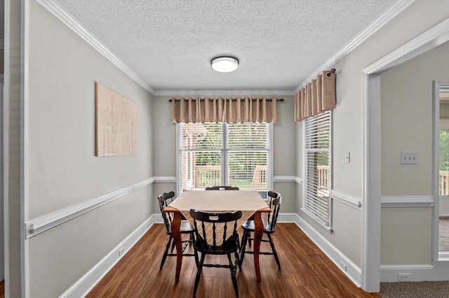 914 Deercrest Cir, Evans, GA 30809 - dining room with dark wood-style floors, a textured ceiling, baseboards, and crown molding