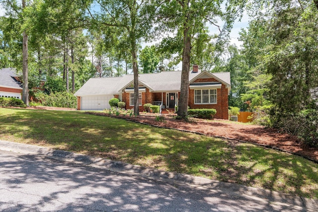 914 Deercrest Cir, Evans, GA 30809 - view of front of home with a front lawn, brick siding, and an attached garage