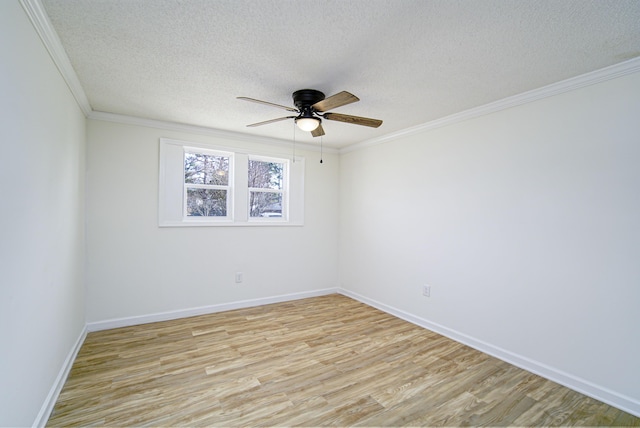 unfurnished room featuring a textured ceiling, light hardwood / wood-style flooring, and ornamental molding