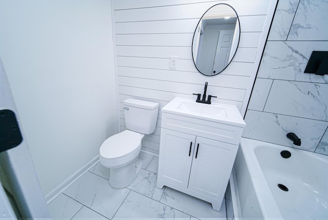 bathroom featuring toilet and vanity